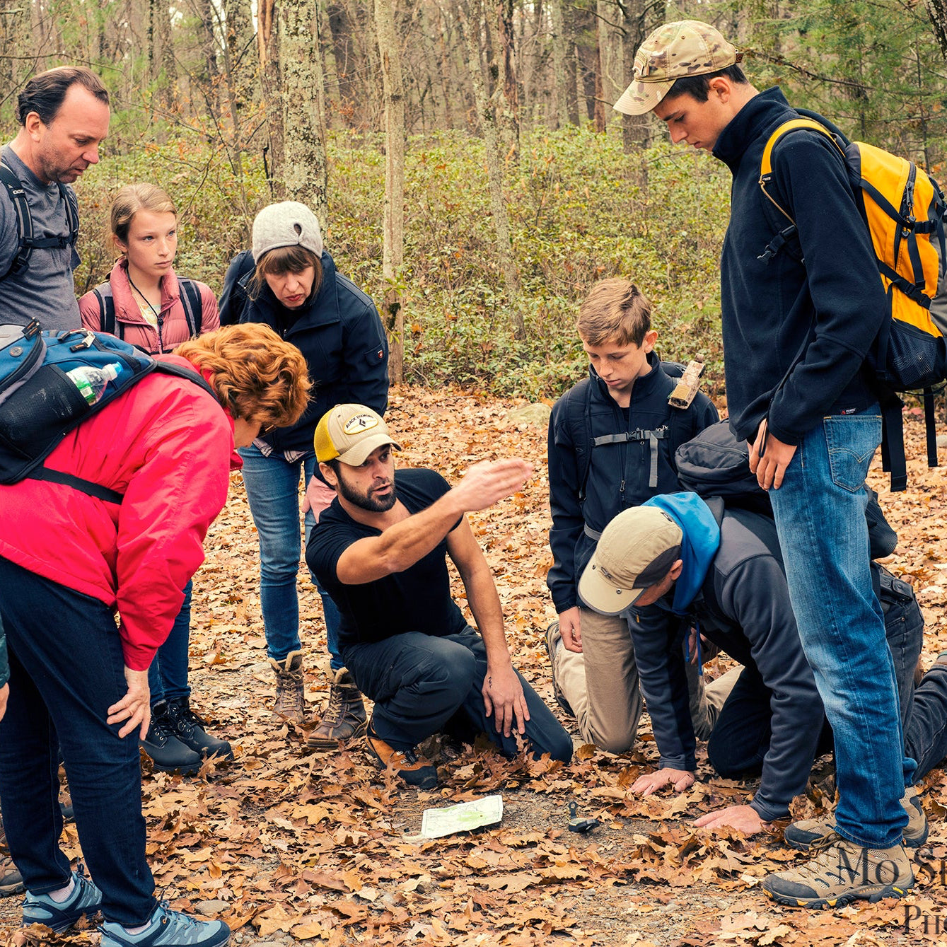 Survival instructor teaching navigation 