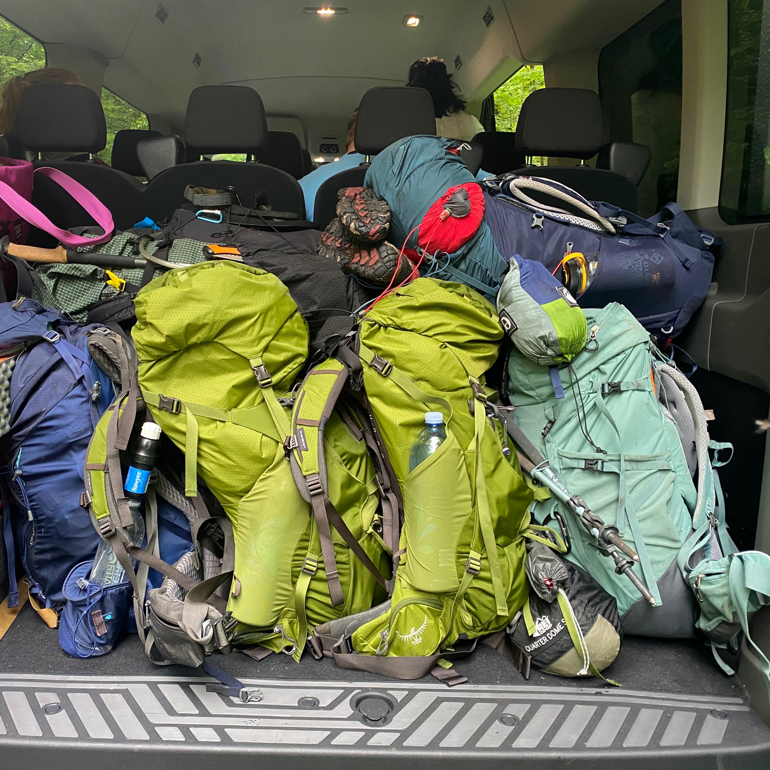 Backpacks and bags packed inside a vehicle